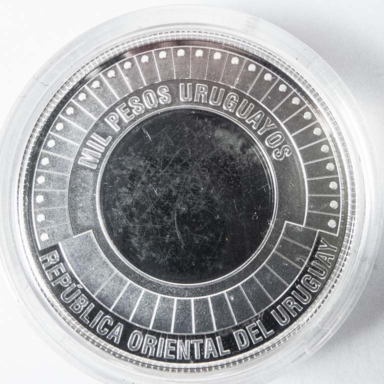 Moneda de plata de Uruguay, 1000 pesos del 2022 - Conmemorativa del 50 aniversario del "Milagros de los Andes" presentada en capsula de acrilico. - Peso: 12,5gr