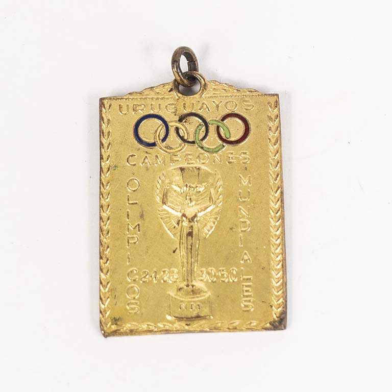 Medalla de bronce y esmalte de la Repùblica Oriental del Uruguay - Uruguayos campeones olimpicos y mundiales otorgada a Luis A. Rijo campeòn Mundial 1950 el 18-VII-75