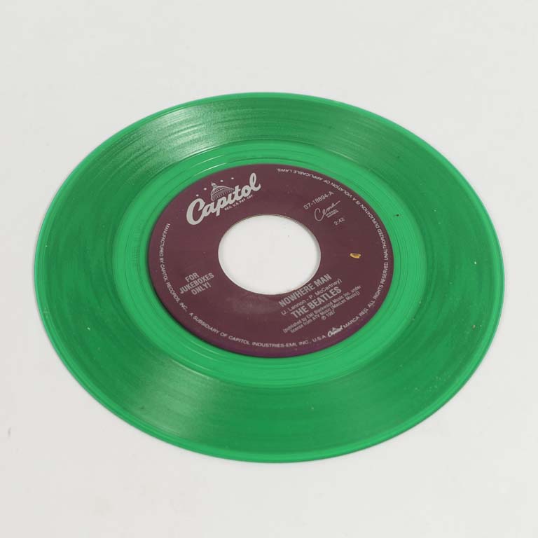 Serie especial para coleccionista ,disco vinilo single seriado en color del sello Capitol, Made in USA: Nowhere man. Color verde